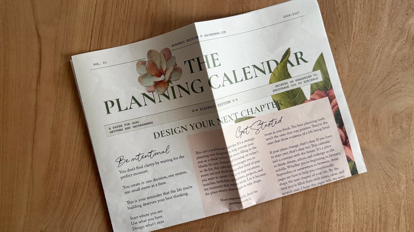 Front cover of The Planning Calendar reading Design Your Next Chapter, with magnolia artwork and the Be Intentional and Get Started essays.